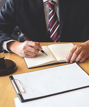 businessman writing notes