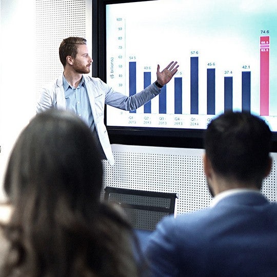 man presenting data