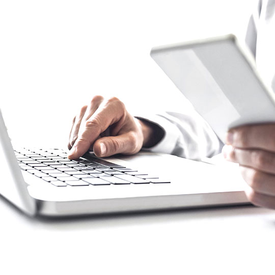 using a tablet and laptop at the same time