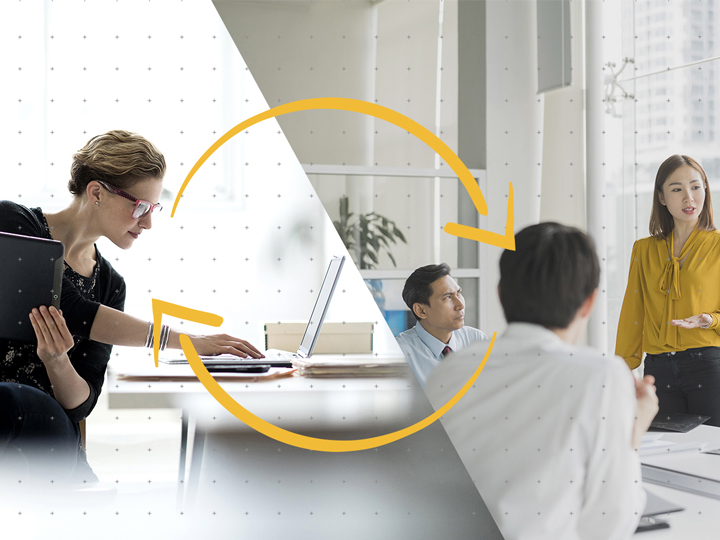 people working in a hybrid workspace