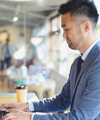 man typing on a keyboard