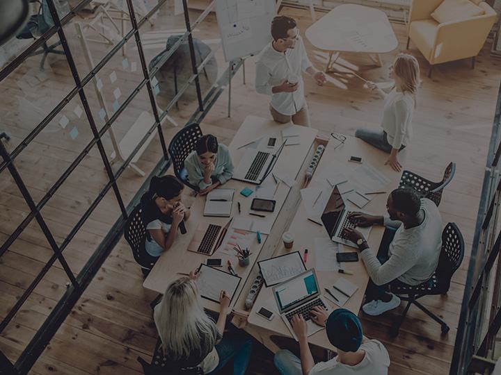 La nostra filosofia overhead office shot