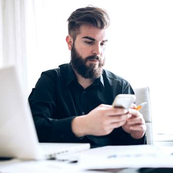 Kyocera MyPanel man looking into her mobile